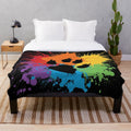 Soft, plush blanket with a cute animal print design in a rainbow color scheme