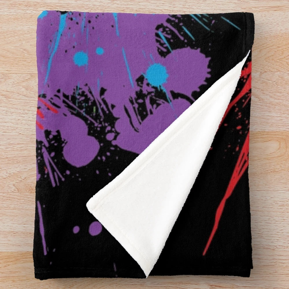 Soft, plush blanket with a cute animal print design in a rainbow color scheme