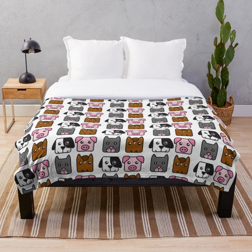 Soft and cuddly plush blanket featuring adorable animal designs