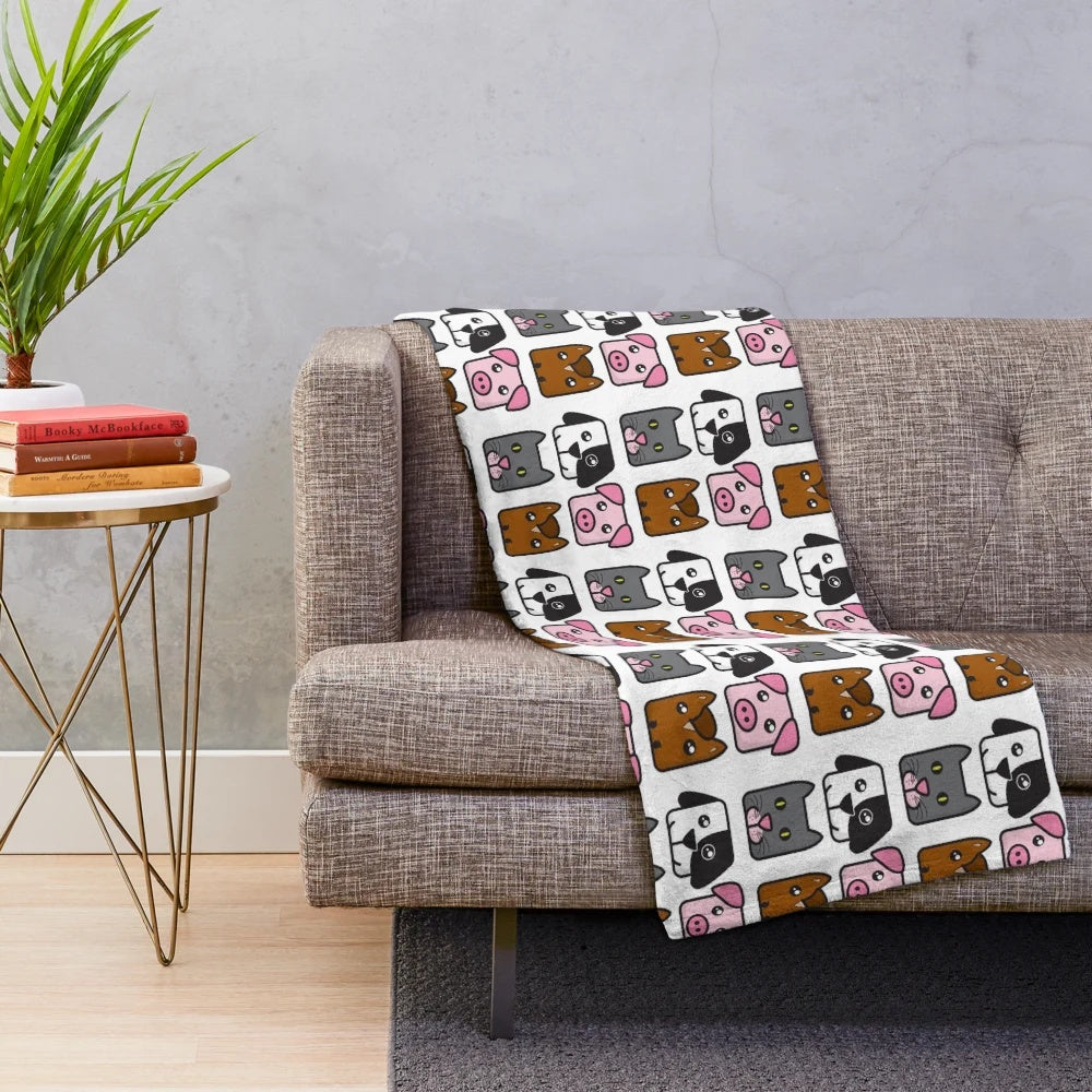 Soft and cuddly plush blanket featuring adorable animal designs