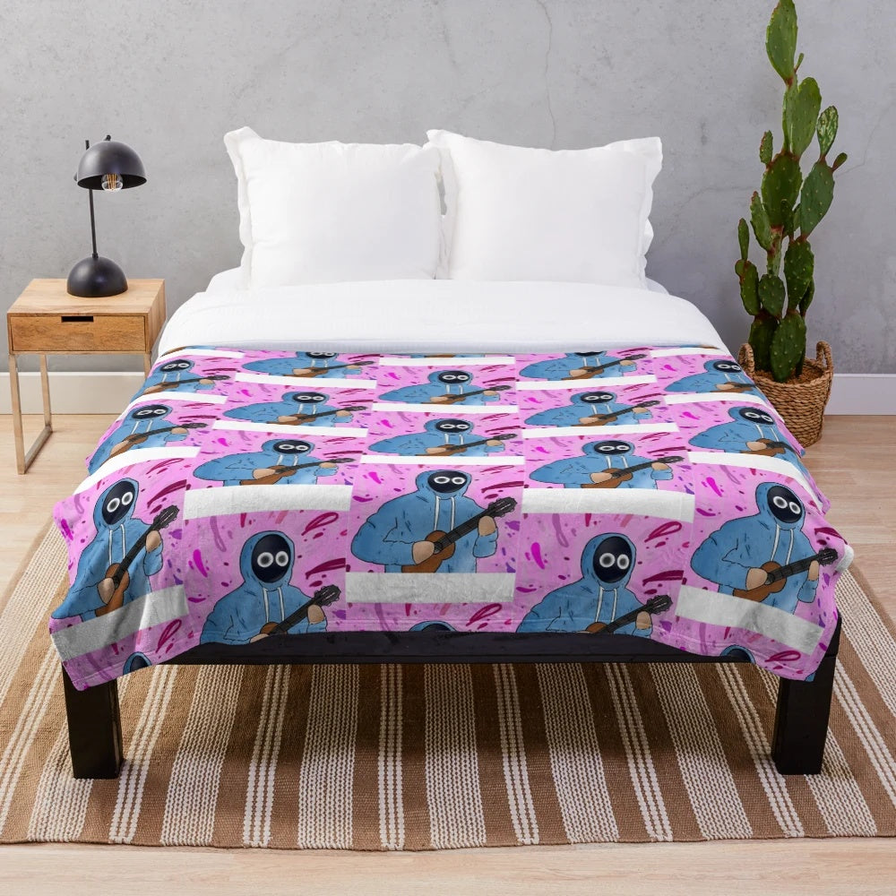 Plush blanket with an anime boy holding a ukulele design