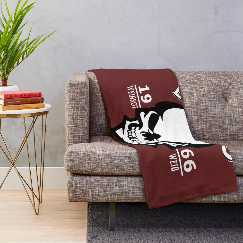 Soft and plush football-themed blanket for Berlin sports fans