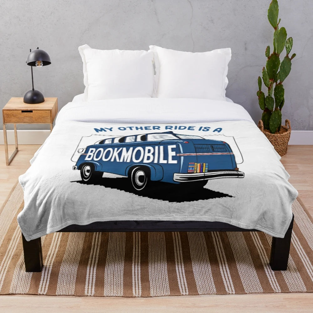 Plush blanket with the text "My Other Ride Is A Bookmobile" for book lovers and reading enthusiasts