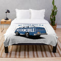 Plush blanket with the text "My Other Ride Is A Bookmobile" for book lovers and reading enthusiasts