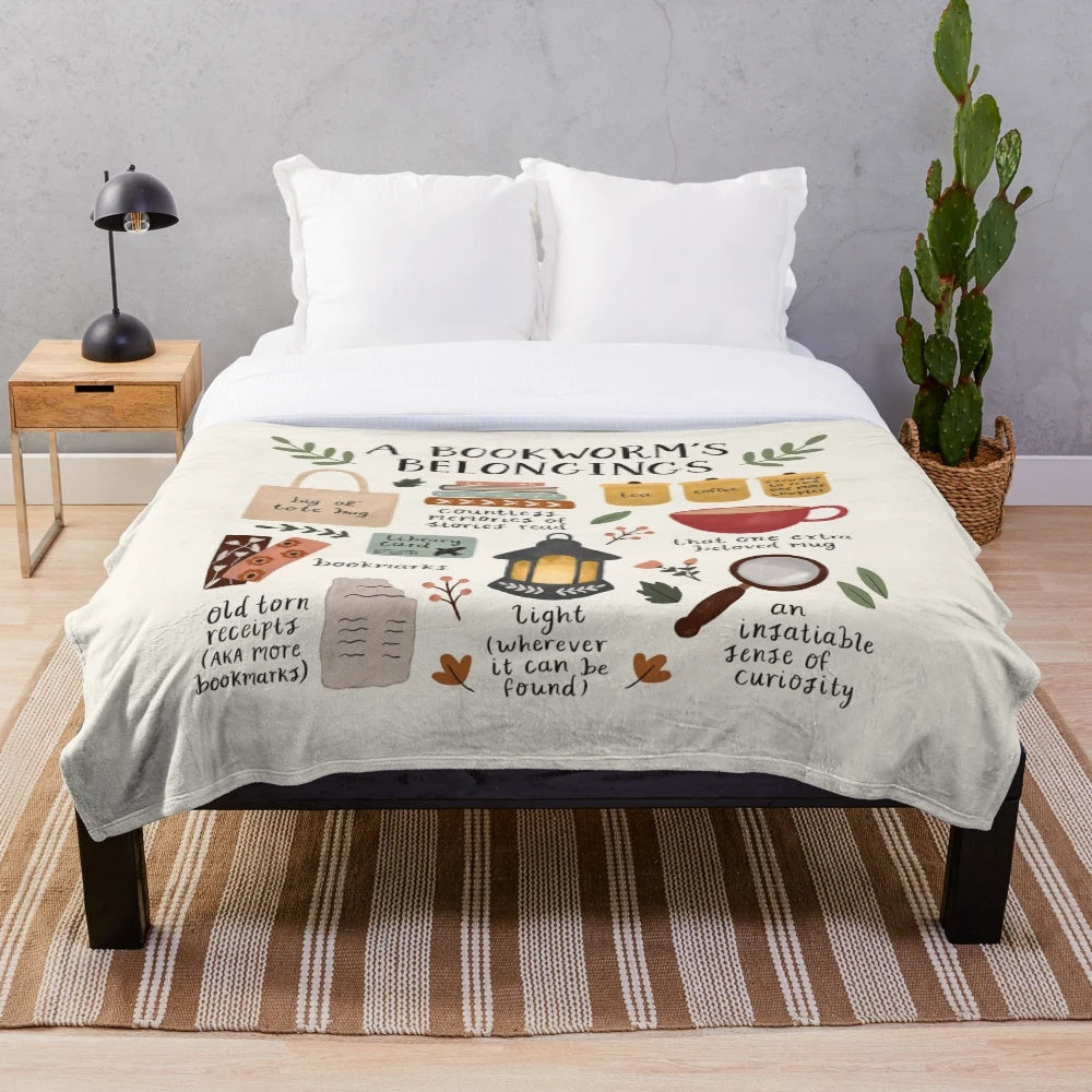 Cozy plush blanket with a stack of books design for book lovers