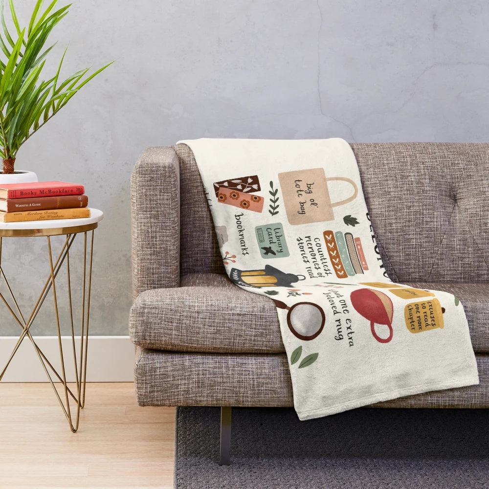 Cozy plush blanket with a stack of books design for book lovers