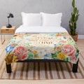 Cozy plush blanket with a fairy tale inspired watercolor and floral design
