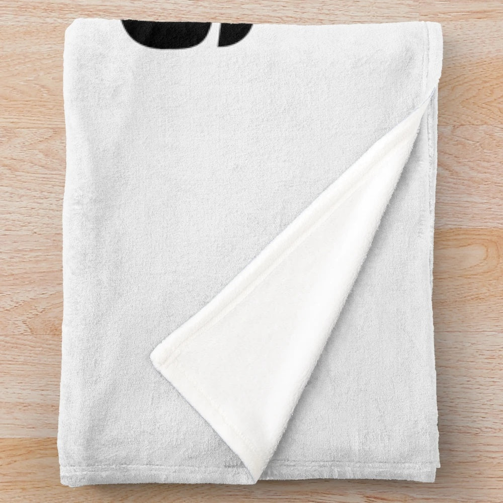 A plush and cozy blanket for reading and book lovers