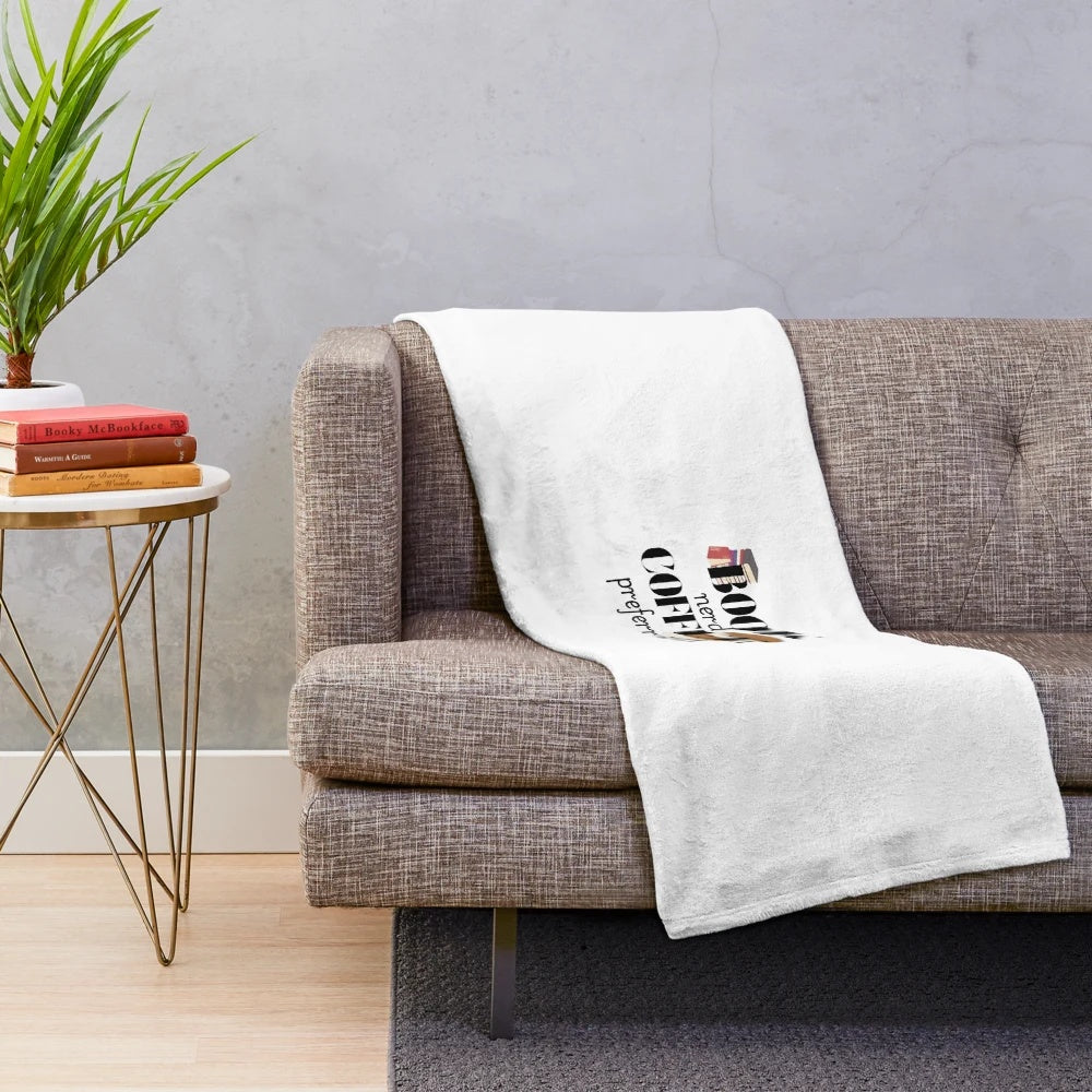 Plush blanket featuring a book and coffee design for book lovers