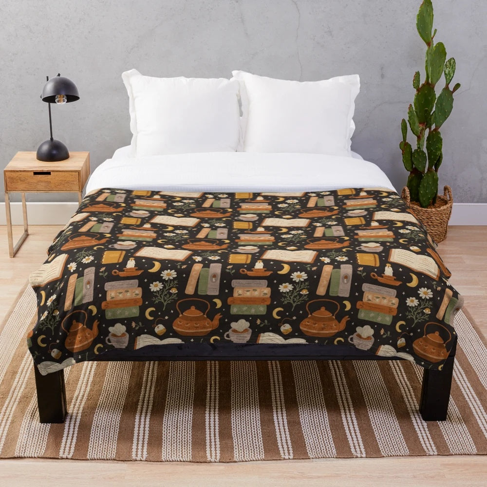 Cozy plush blanket with floral and literary patterns for book lovers