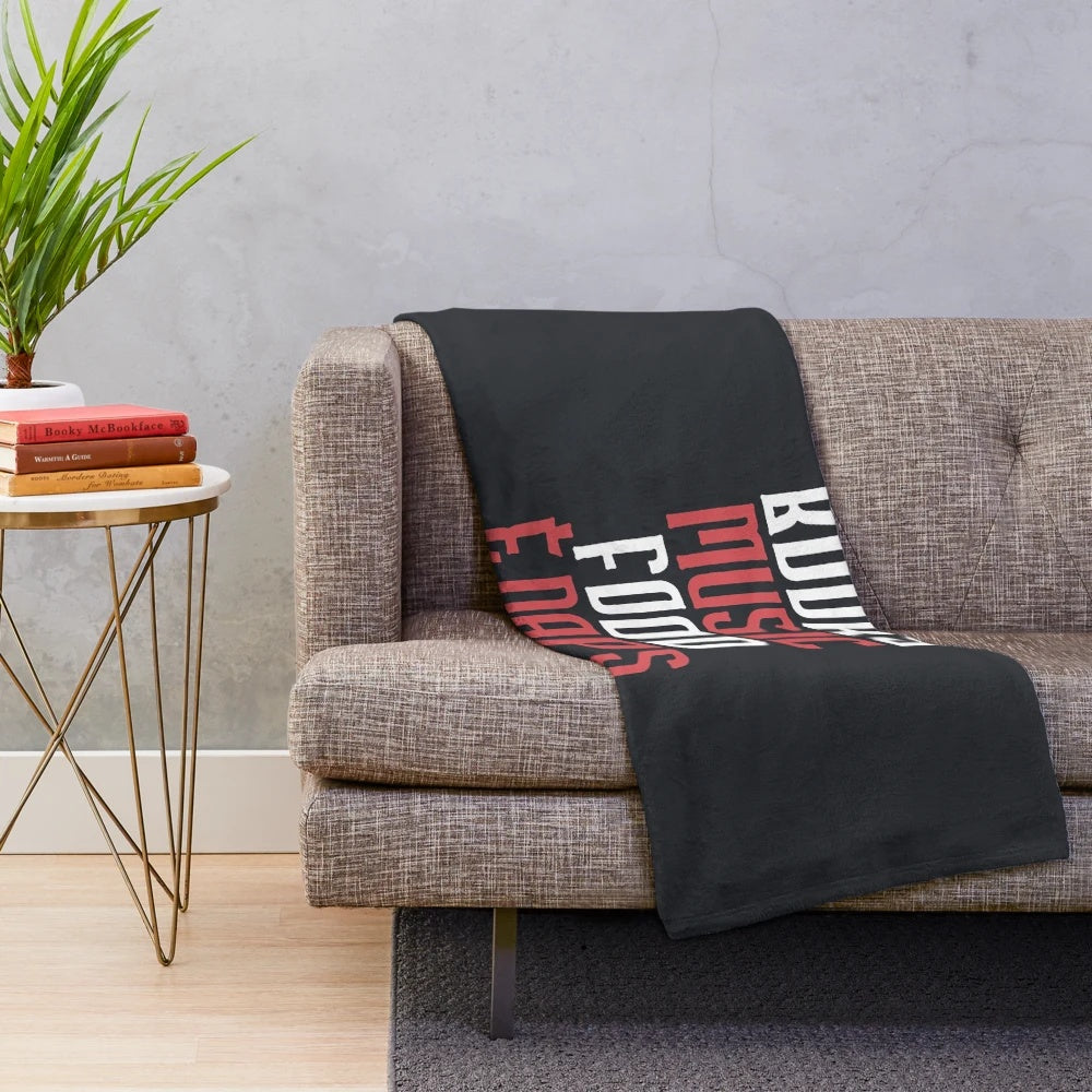 Plush blanket with books, music, food, and naps design