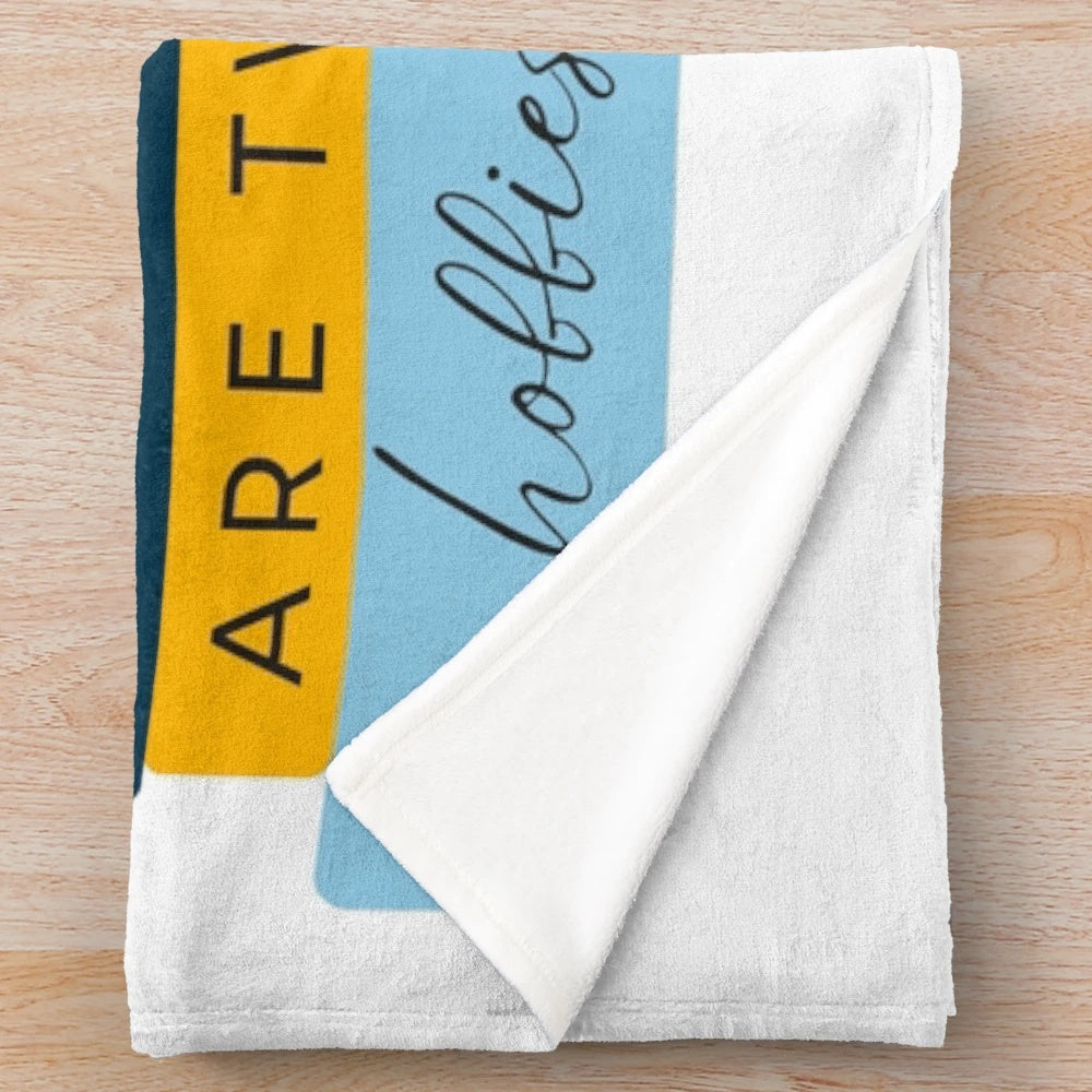 Cozy plush blanket with book and reading-themed design