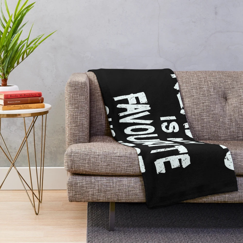Plush blanket with "reading is my favorite subject" typography design