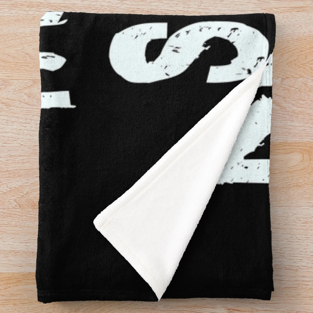 Plush blanket with "reading is my favorite subject" typography design