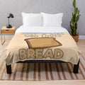 Soft and warm plush blanket with a "Just A Girl Who Loves Bread" design, perfect for bread lovers.