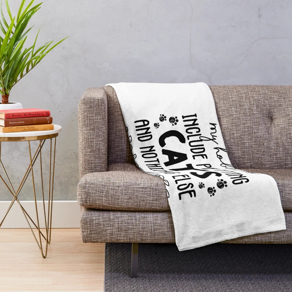 Cozy plush blanket featuring a funny cat lover design with the text "My hobbies include petting cats and nothing else