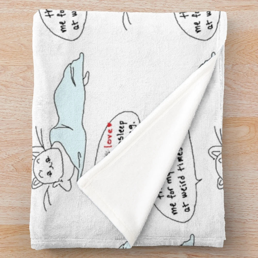 A plush, cozy blanket with a cat design, perfect for cat lovers