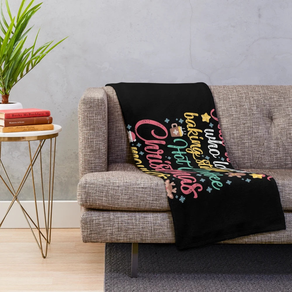 Cozy plush blanket featuring Christmas movies and baking design