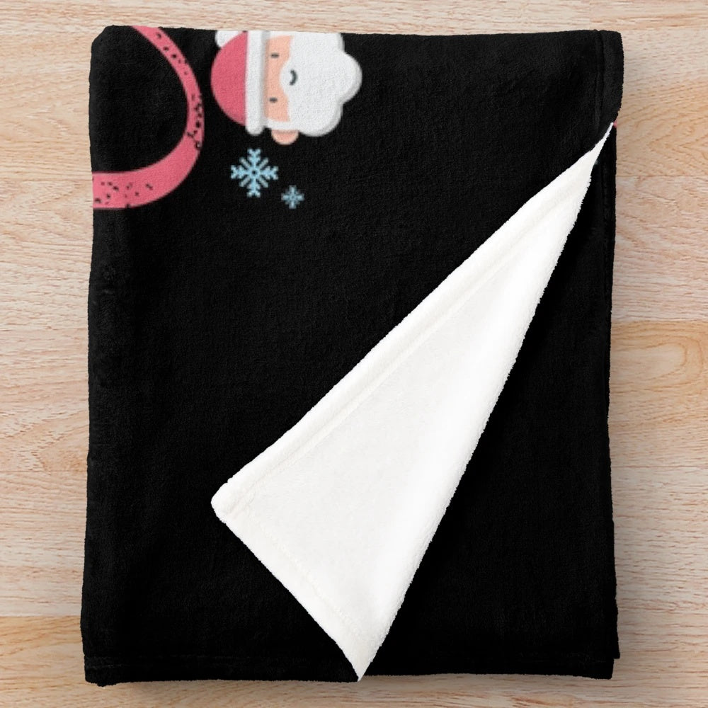 Cozy plush blanket featuring Christmas movies and baking design