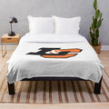 Plush blanket featuring the Lewis and Clark College logo