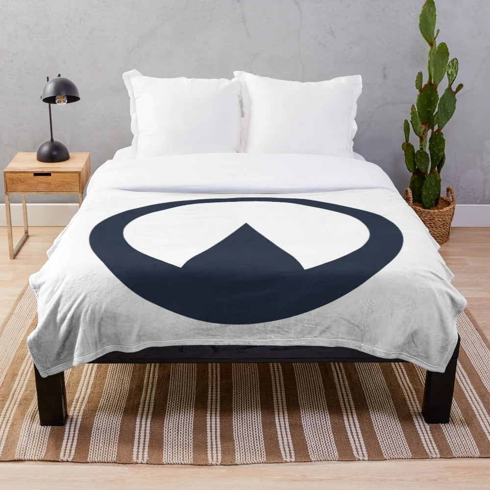 Collingwood College plush blanket with green design