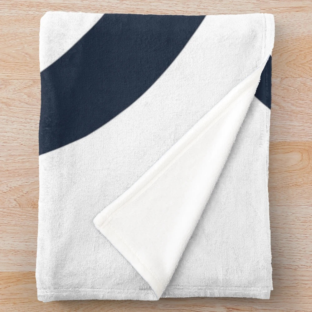 Collingwood College plush blanket with green design