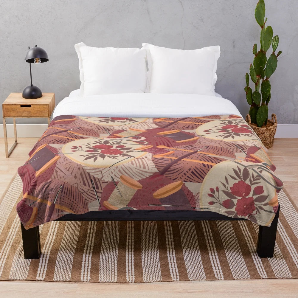 Cozy plush blanket with patterns for knitting, crocheting, embroidery, and sewing enthusiasts