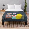 Plush blanket with sewing and stitching motif