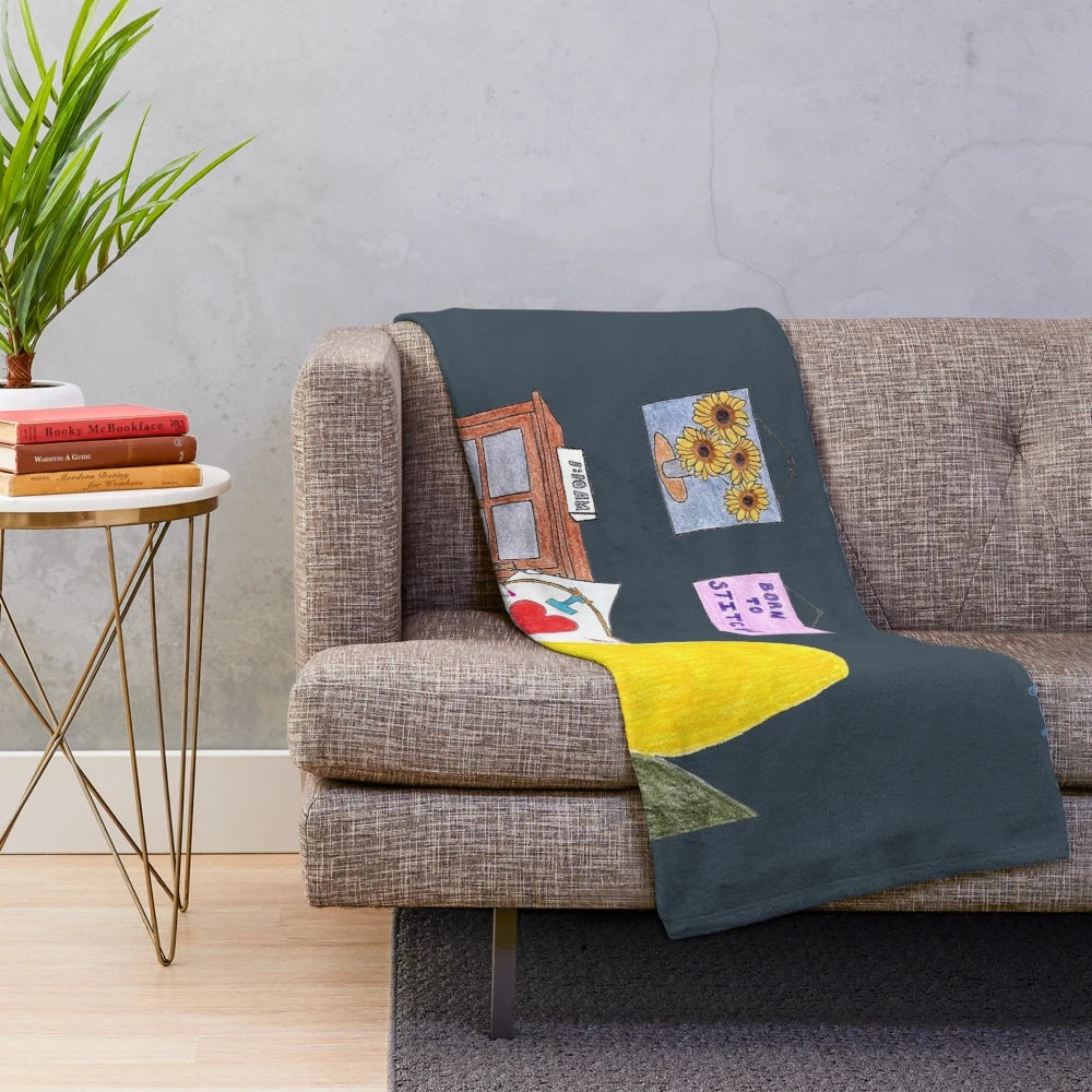 Plush blanket with sewing and stitching motif