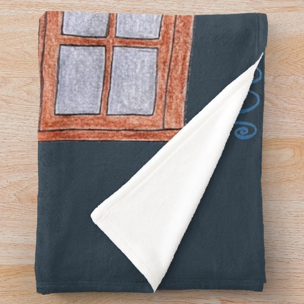 Plush blanket with sewing and stitching motif