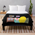 Sewing-themed plush blanket with blond and black design