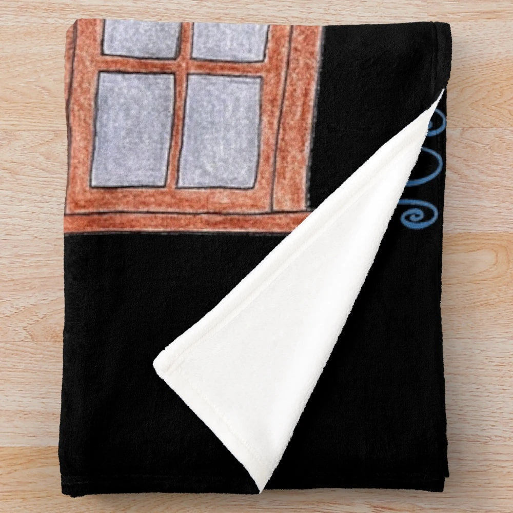 Sewing-themed plush blanket with blond and black design