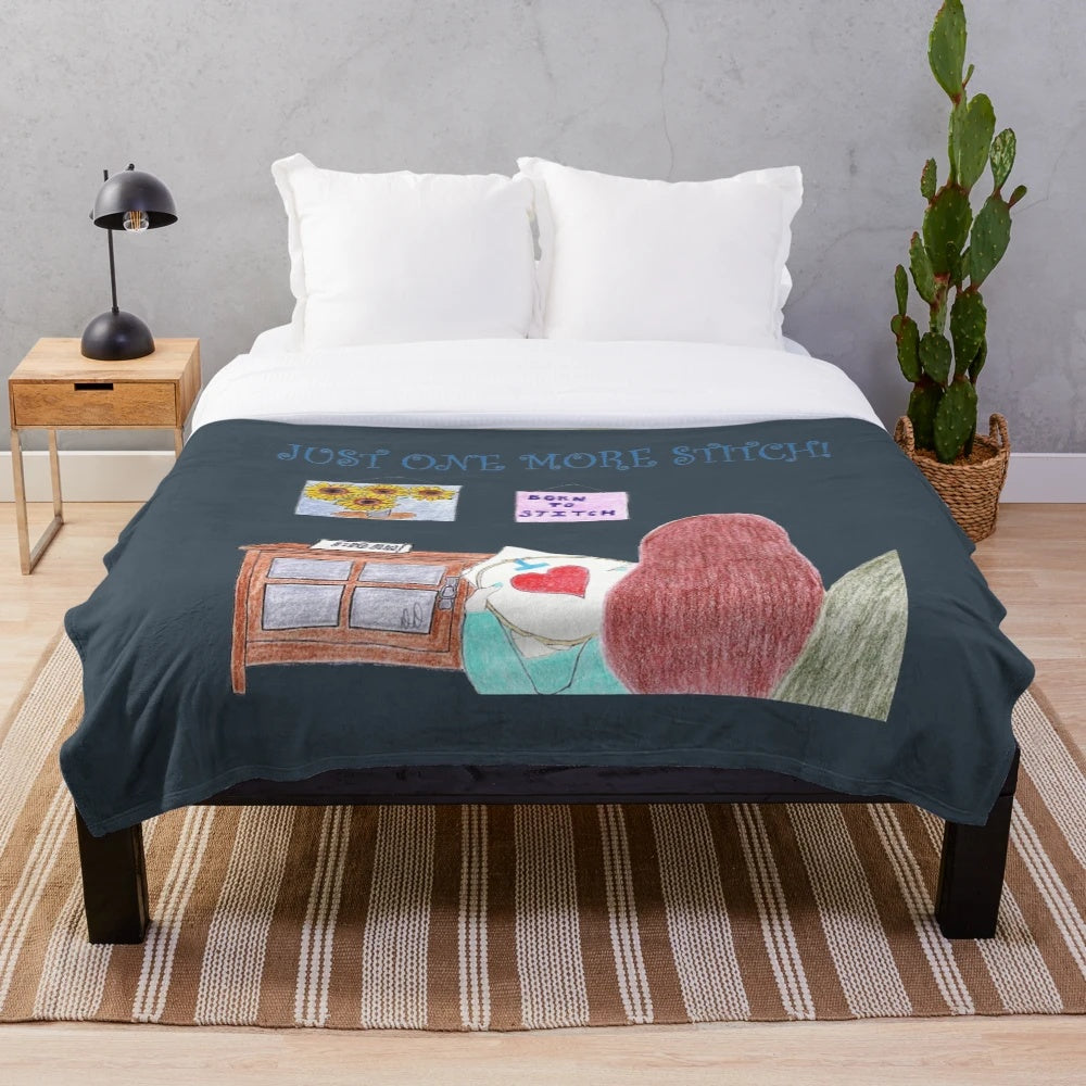 Plush blanket with sewing, stitching, and cross stitch design