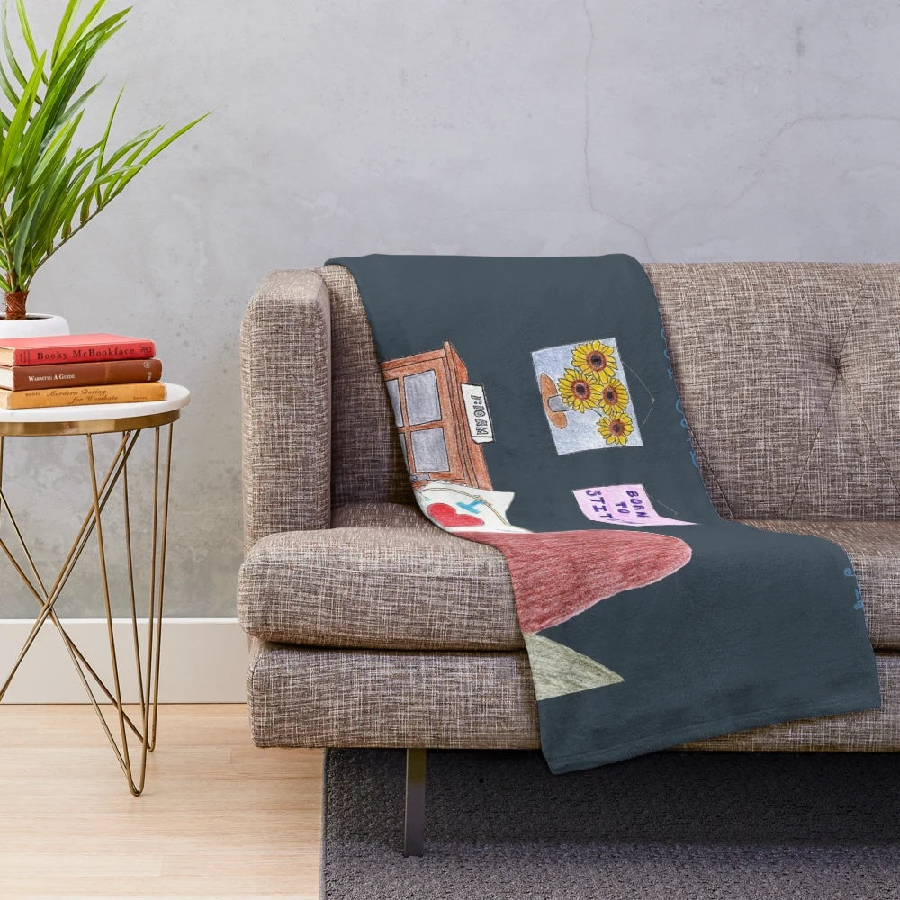 Plush blanket with sewing, stitching, and cross stitch design