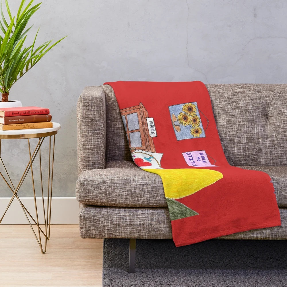 Plush blanket with sewing, stitching, and cross stitch design