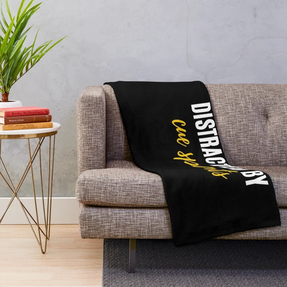 Plush blanket with text "Easily Distracted By Cue Sports