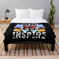 Plush blanket with inspirational teaching-themed design