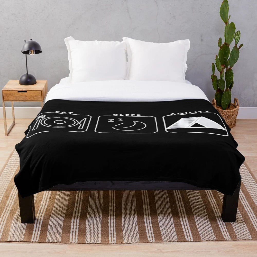 Cozy plush blanket with "Eat, Sleep, Agility" design for dog agility lovers