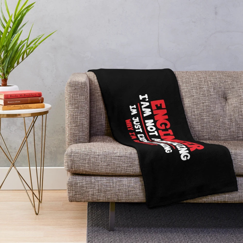 Plush blanket with engineering-themed design