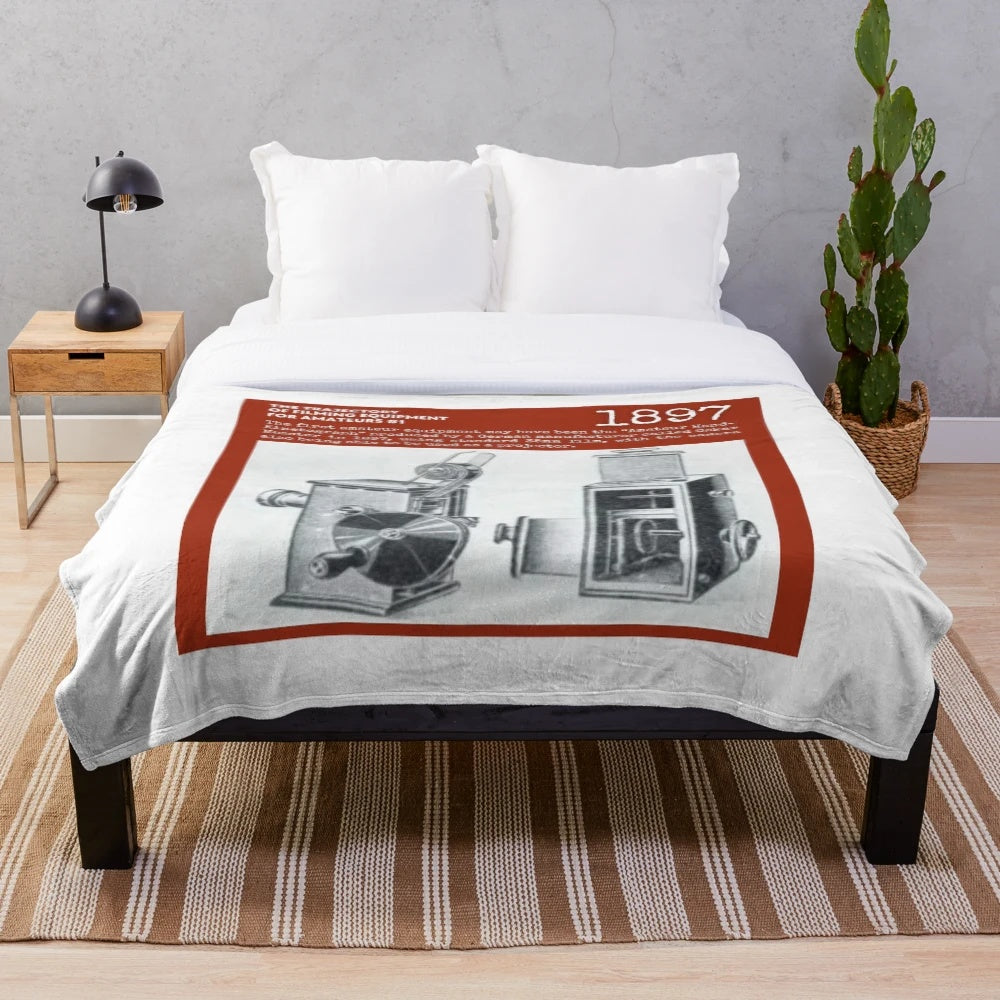 Plush blanket with filmmaking and movie accessories design