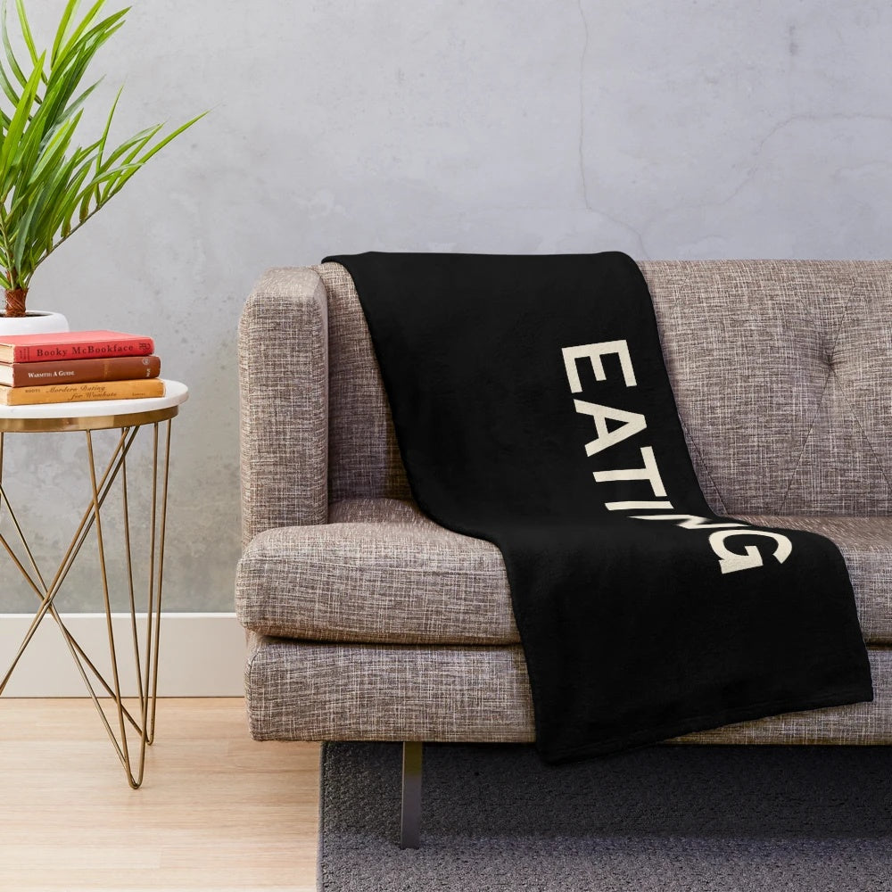 Plush blanket with food and napping themed design