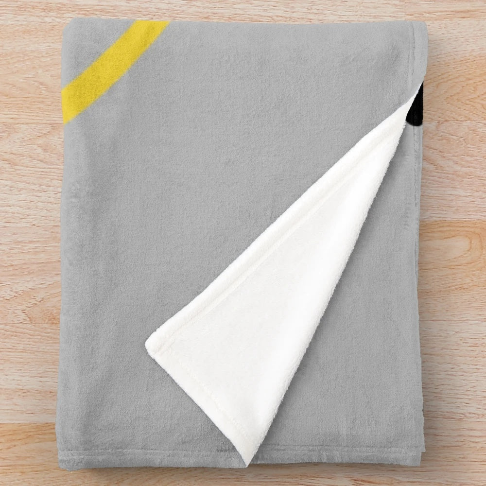 Plush blanket with a games design for gaming enthusiasts