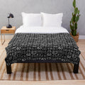 Plush blanket with gaming controllers design