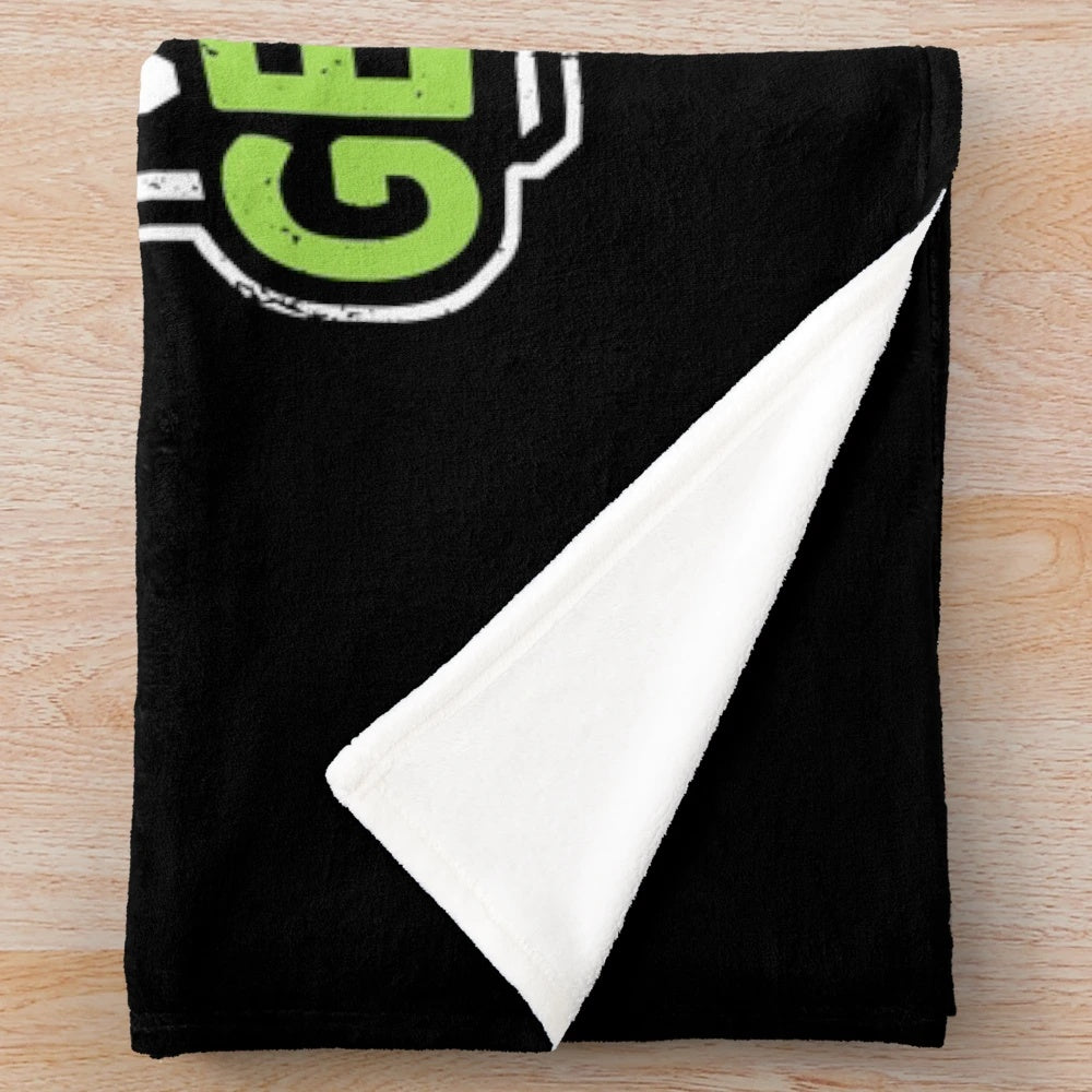 Plush geocaching-themed blanket with a compass design