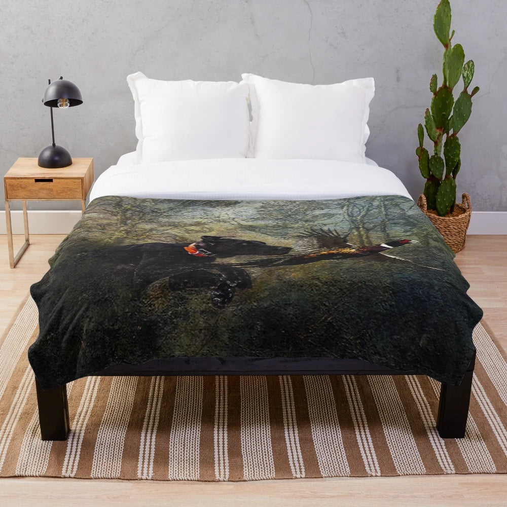 German Shorthaired Pointer (GSP) dog on a plush hunting-themed blanket