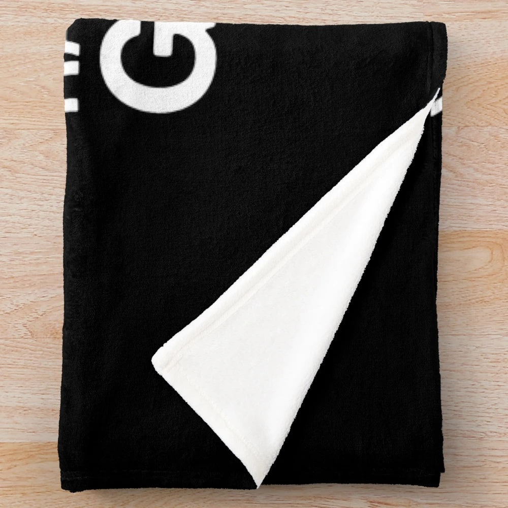 Cozy plush blanket with guitars and music-themed design