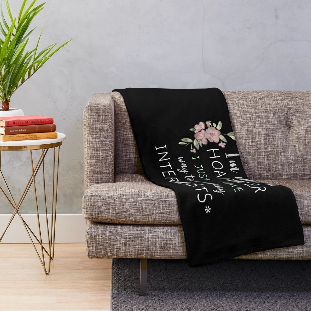Plush blanket with a humorous "I am not a hoarder" design