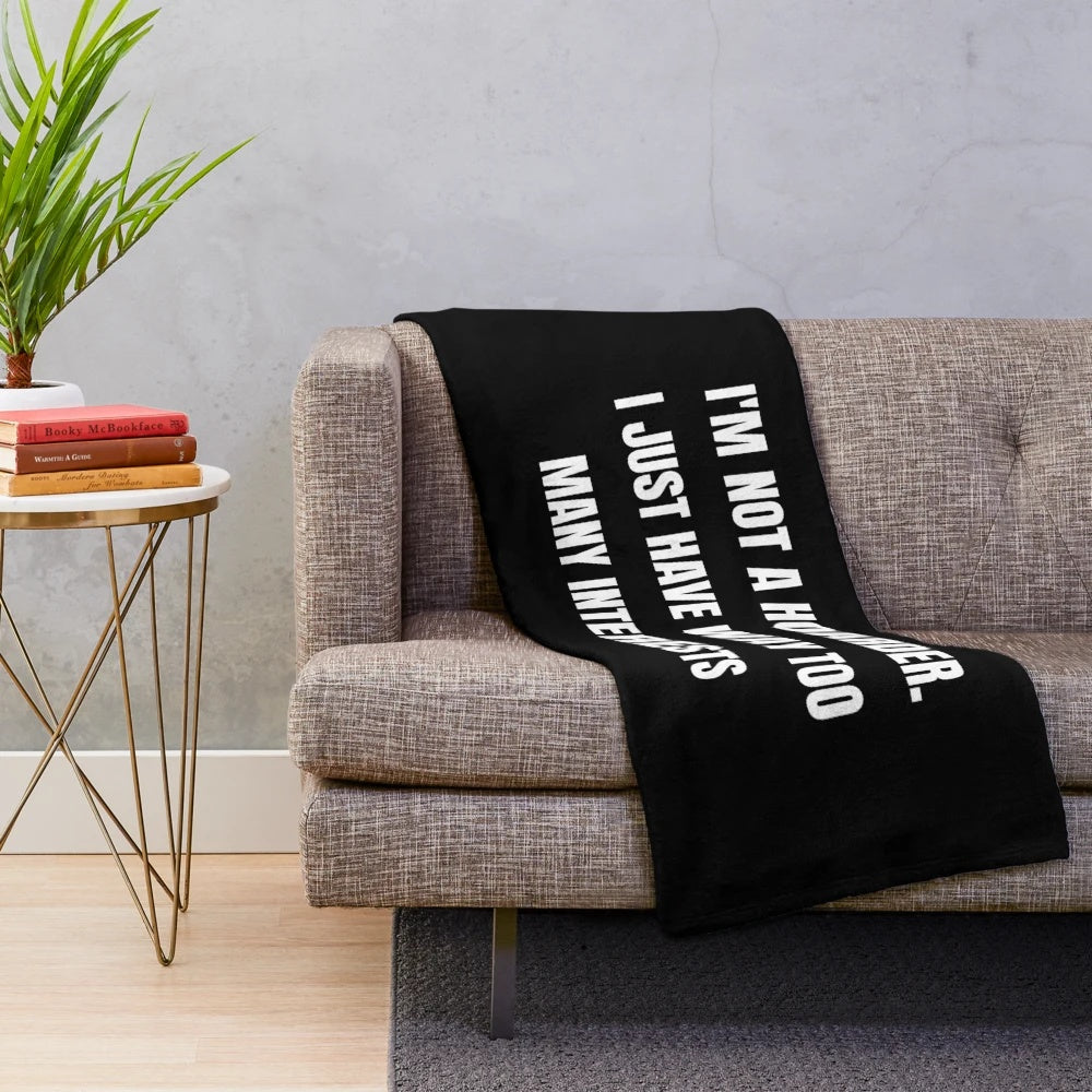 Cozy plush blanket for hobby collectors with "I Am Not a Hoarder" design