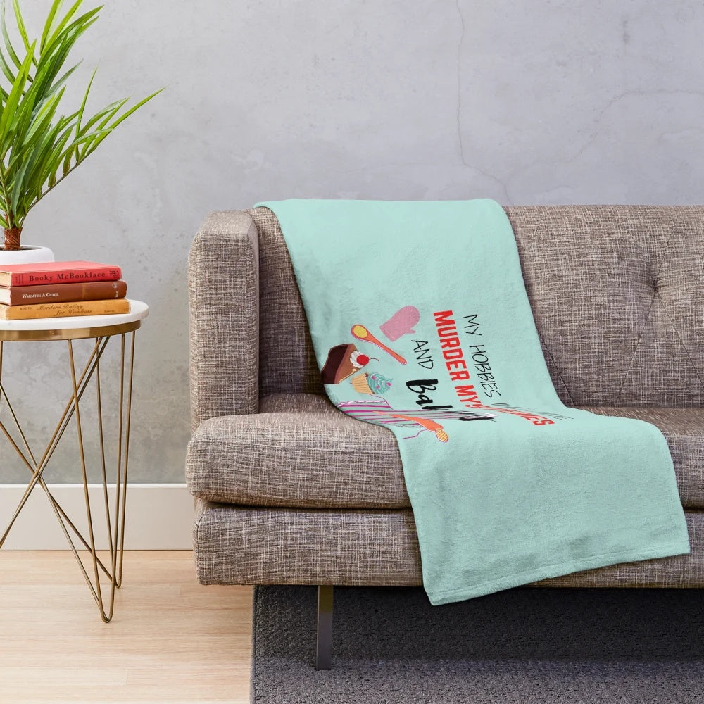 Plush blanket with 'My Hobbies Include Murder Mysteries and Baking' design