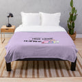 Plush blanket with "My Hobbies Include True Crime and Crafting" design